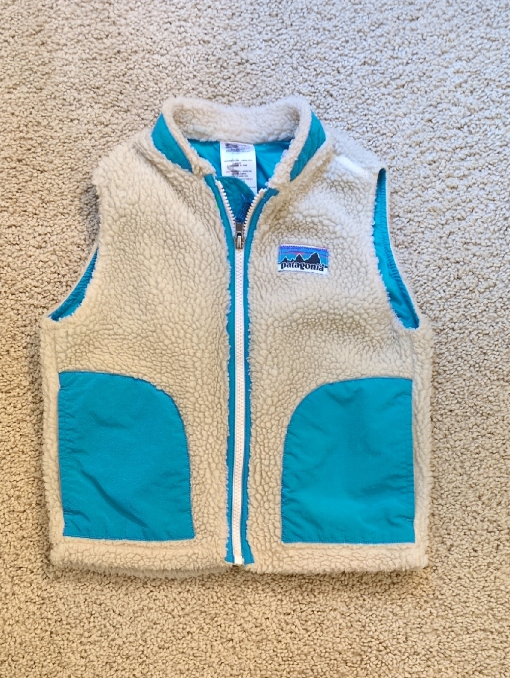 Patagonia Kids Cream Sherpa Vest with Teal Pocket Accents
